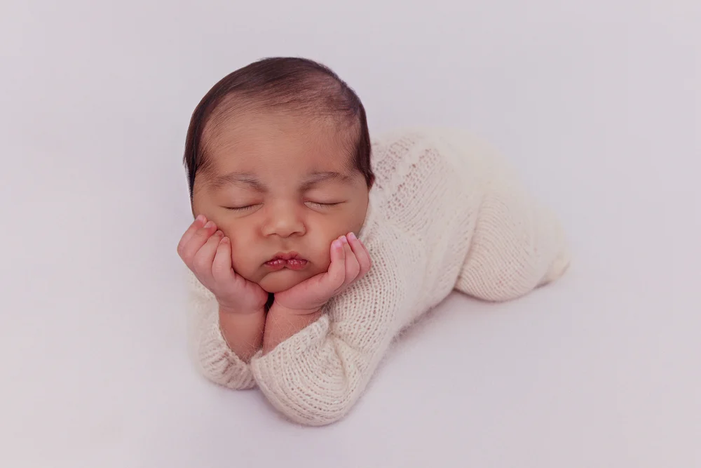baby during first-birthday cake smash session in Orlando studio